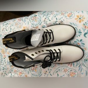 Doc Martens white boots size 8 men’s, size 9 women’s brand new, never worn